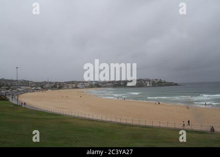 Sydney’s Bondi Beach was almost empty on a wet and rainy Christmas Day. Stock Photo