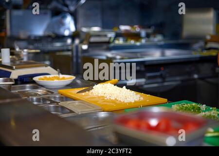 fresh red vegetables background with Blurred chef cooking food cutting prepare hands knife preparing vegetables Stock Photo