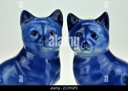 Chinese blue and white porcelain cat figurines. Excellent image for friendship, marriage and fidelity. Stock Photo