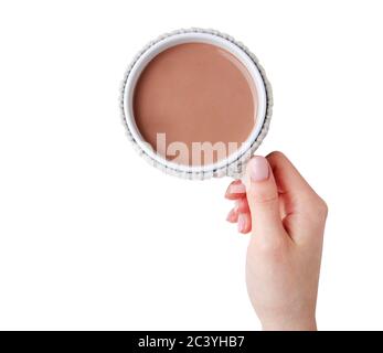 Woman hand holding a coffee chocolate cup isolated on white background. Top view. Stock Photo