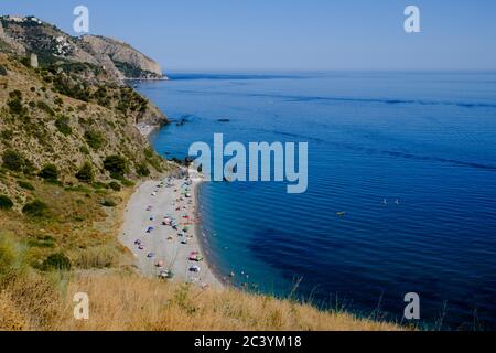 First day of the new normal after lockdown in Spain. Alberquillas beach near Maro, Nerja, Malaga, Costa Del Sol, Spain. Stock Photo