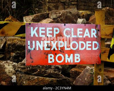 Keep Clear Unexploded Bomb sign Stock Photo