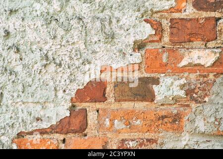 Old red brick wall with concrete. Texture Stock Photo