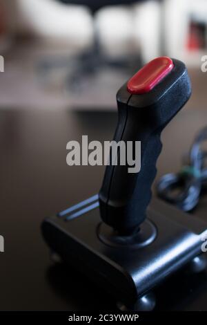 Joystick arcade game for computer and console from 80's. Black color with red buttons Stock Photo