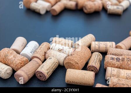BERLIN - JUN 23: Collection of wine corks on black background in Berlin on June 23. 2020 in Germany Stock Photo