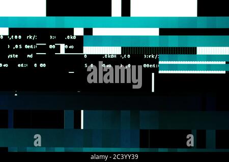 Overloading the graphics card on a computer. Glitches and code on the screen Stock Photo