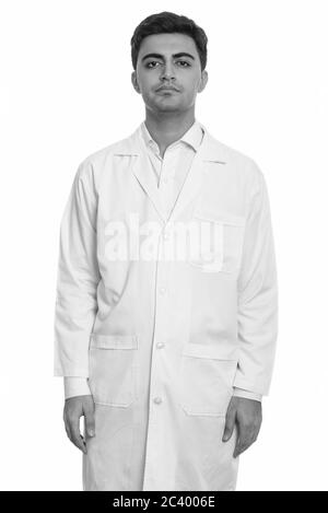 Portrait of young handsome Persian man doctor Stock Photo
