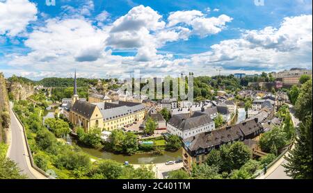 Panoramic view on Abbaye de Neumunster and St. Jean du Grund church in Luxembourg a beautiful summer day, Luxembourg Stock Photo