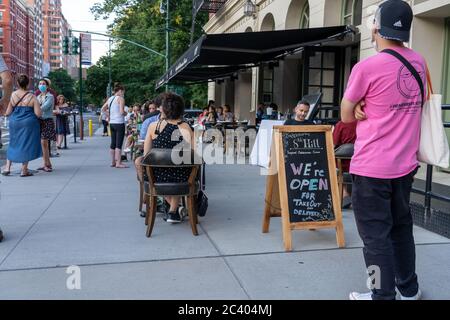 New York, United States. 22nd June, 2020. Customers enjoy meals at the 8th Hill restaurant as the city moves into phase two re-opening from the coronavirus pandemic in New York City.New York State Governor Andrew Cuomo has announced that New York is on track for Phase 2 re-opening. Credit: SOPA Images Limited/Alamy Live News Stock Photo