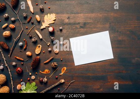 Blank mail envelope mock up top view flat lay with autumn season decoration Stock Photo
