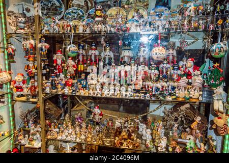 Showcase of souvenir shop in city center, close up view. Souvenir shop, view from street at night. Shopping in Vienna. Stock Photo