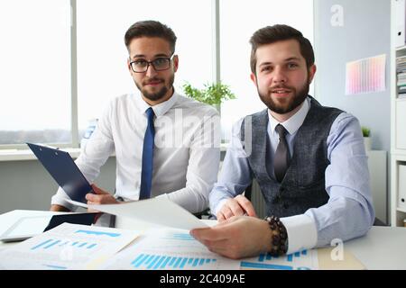 Joyful business colleagues working together in office Stock Photo
