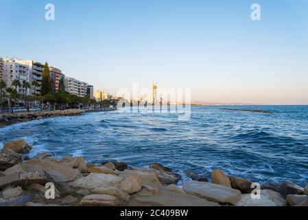 View of the city of Limassol and a large new skyscraper under construction. The concept of travel and tourism. Stock Photo