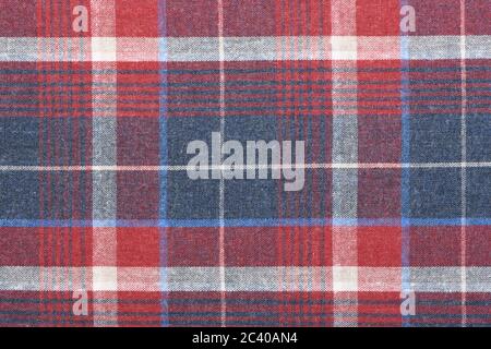 Red dark blue checkered shirt cloth background. High resolution photo. Full depth of field. Stock Photo