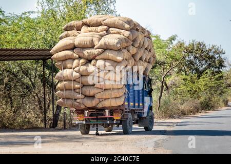 Indian cargo truck overloaded near udaipur, India. Stock Photo