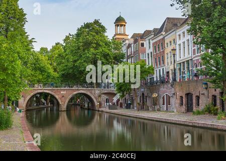Traditional dutch houses, streets and bridges during dusk. Oudegracht canal, Utrecht city centre. High Dynamic Range HDR image Stock Photo