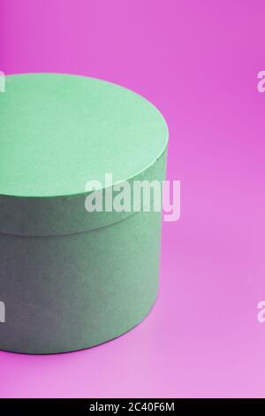 Round Box on pink background for gift. Stock Photo