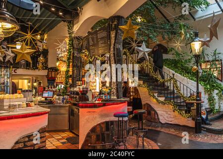 Hundertwasser village interior view. Building with the unique Hundertwasser architectural style, featuring a coffee bar, souvenir, arts type shops. Stock Photo