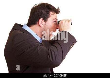 Man in a suit looks in amazement through binoculars Stock Photo
