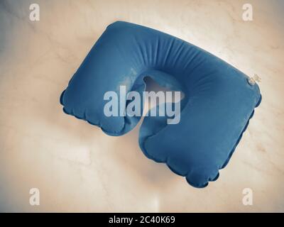 Blue inflatable pillow for comfortable neck position Stock Photo