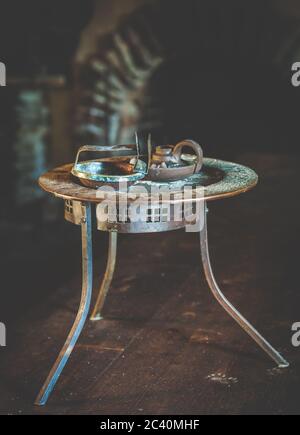 Vintage rusty table with candle holders in vintage style Stock Photo