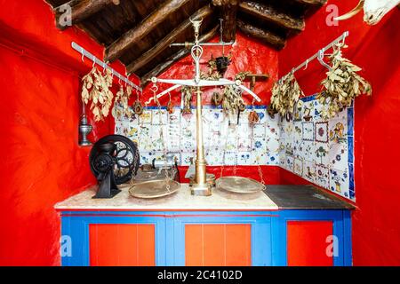 Vintage butcher shop with scale and meat grinder Stock Photo