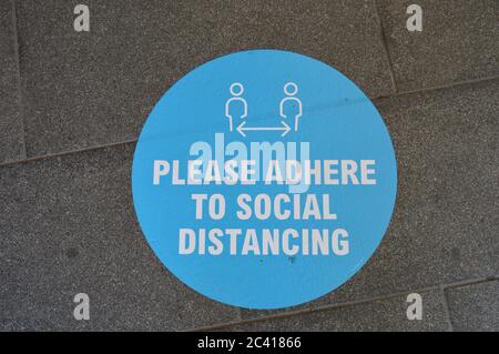 London, UK. 23 June 2020. Social Distancing signs at Ealing Broadway Shopping Centre, informing people to adhere to the government guidance. Stock Photo