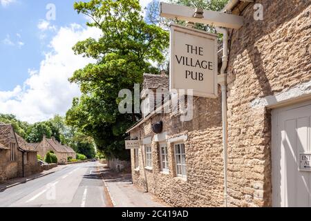 The imaginatively named Village Pub in the Cotswold village of Barnsley, Gloucestershire UK Stock Photo