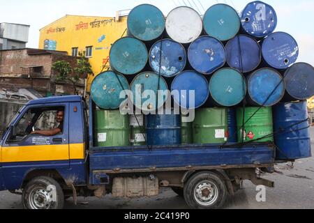 Dhaka, Dhaka, Bangladesh. 23rd June, 2020. Oil drums are being taken by a mini-truck during the COVID-19 pandemic. Credit: Md. Rakibul Hasan/ZUMA Wire/Alamy Live News Stock Photo