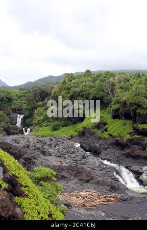 Multiple waterfalls of the Seven Sacred Pools, O'heo Gulch, in Haleakala National Park, Maui, Hawaii, USA Stock Photo