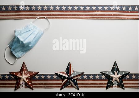 American stars and stripes flat lay over rustic wood background Stock Photo