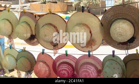 Narihuala, Piura / Peru - April 6 2019: Sale of handmade straw hats in the village of Narihuala near the town of Catacaos Stock Photo