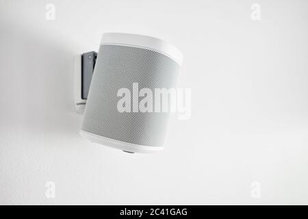 Wall mounted audio speaker on a white background. Stock Photo
