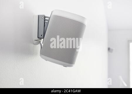 Wall mounted audio speaker on a white background. Stock Photo