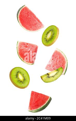 Flowing mix of fruits isolated on white background with shallow depth of field Stock Photo