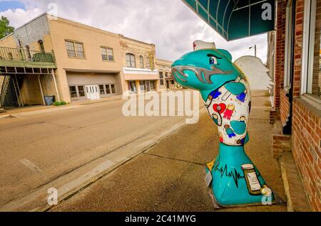 A painted catfish stands in front of Continue Care Home Health, Aug. 11, 2016, in Belzoni, Mississippi. Stock Photo