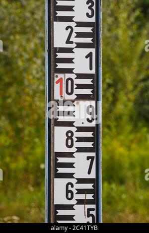 Stream Gauge Scale in a river Stock Photo - Alamy