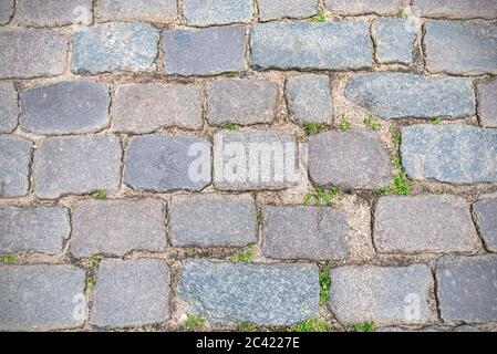 Stone pavement or road in old town as background, vintage cobblestone Stock Photo