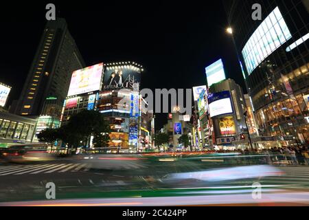 Kyoto, Japan - April 22, 2018: Busy Shibuya Crossing in Tokyo, Japan. Shibuya Crossing is one of the most popular landmarks of Tokyo. Stock Photo