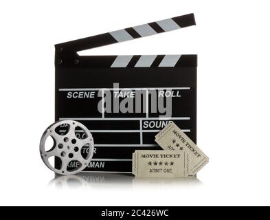 Single, black, open movie clapper or clapper-board with film reel and movie theatre tickets on white background Stock Photo