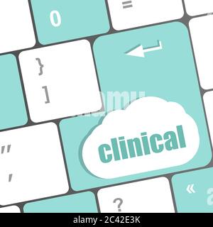 clinical text on laptop computer keyboard enter key Stock Photo