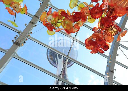 Seattleת WA, USA - September 28, 2019: Glass artwork with the Space Needle as background. the Space Needle was built in the Seattle Center for the 196 Stock Photo