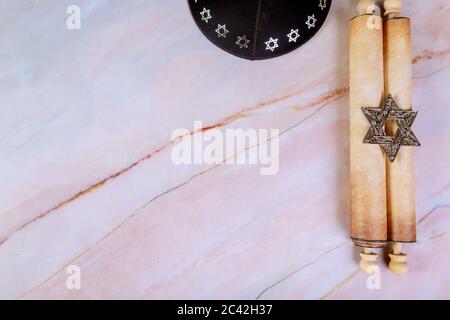 Jewish manuscript, old papyrus roll on abstract background. Stock Photo