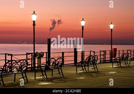 An after sunset view at Southend on Sea, Essex, UK on the end of the longest pleasure pier in the world. Stock Photo