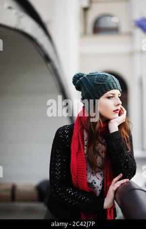 Beautiful young woman standing on the bridge Stock Photo