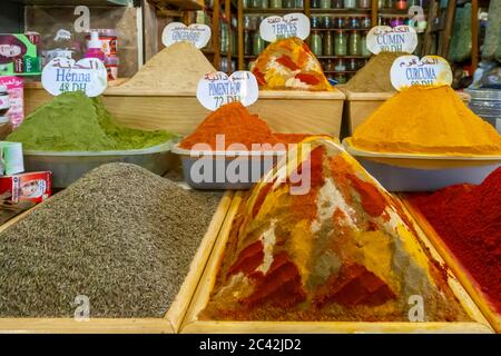 Market stand in Meknes, Marocco. The variety of Moroccan spices can be found in Zugg, the quarter of the spice dealers. Everything seems to be in abundance here: turmeric, ginger, chilli, cinnamon and bay leaf. It smells nice and you would like to take some of everything home with you Stock Photo