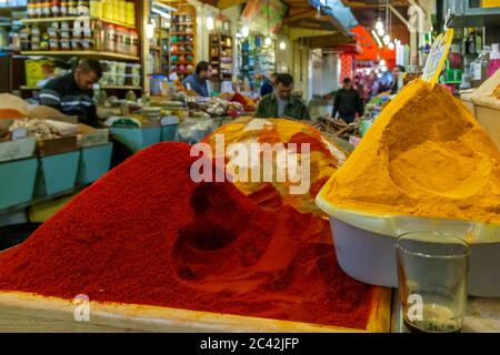 Market stand in Meknes, Marocco. The variety of Moroccan spices can be found in Zugg, the quarter of the spice dealers. Everything seems to be in abundance here: turmeric, ginger, chilli, cinnamon and bay leaf. It smells nice and you would like to take some of everything home with you Stock Photo