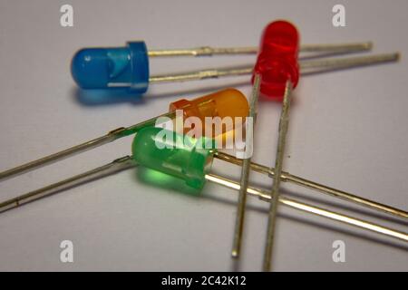 Blue, yellow/orange, green and red light emitting diodes (LEDs) Stock Photo