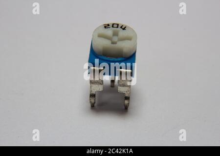 Screwing potentiometer for fine tune on electronic devices Stock Photo