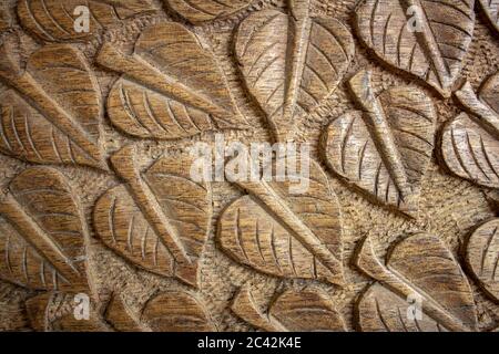 Leaves carved on the top of an old crate Stock Photo